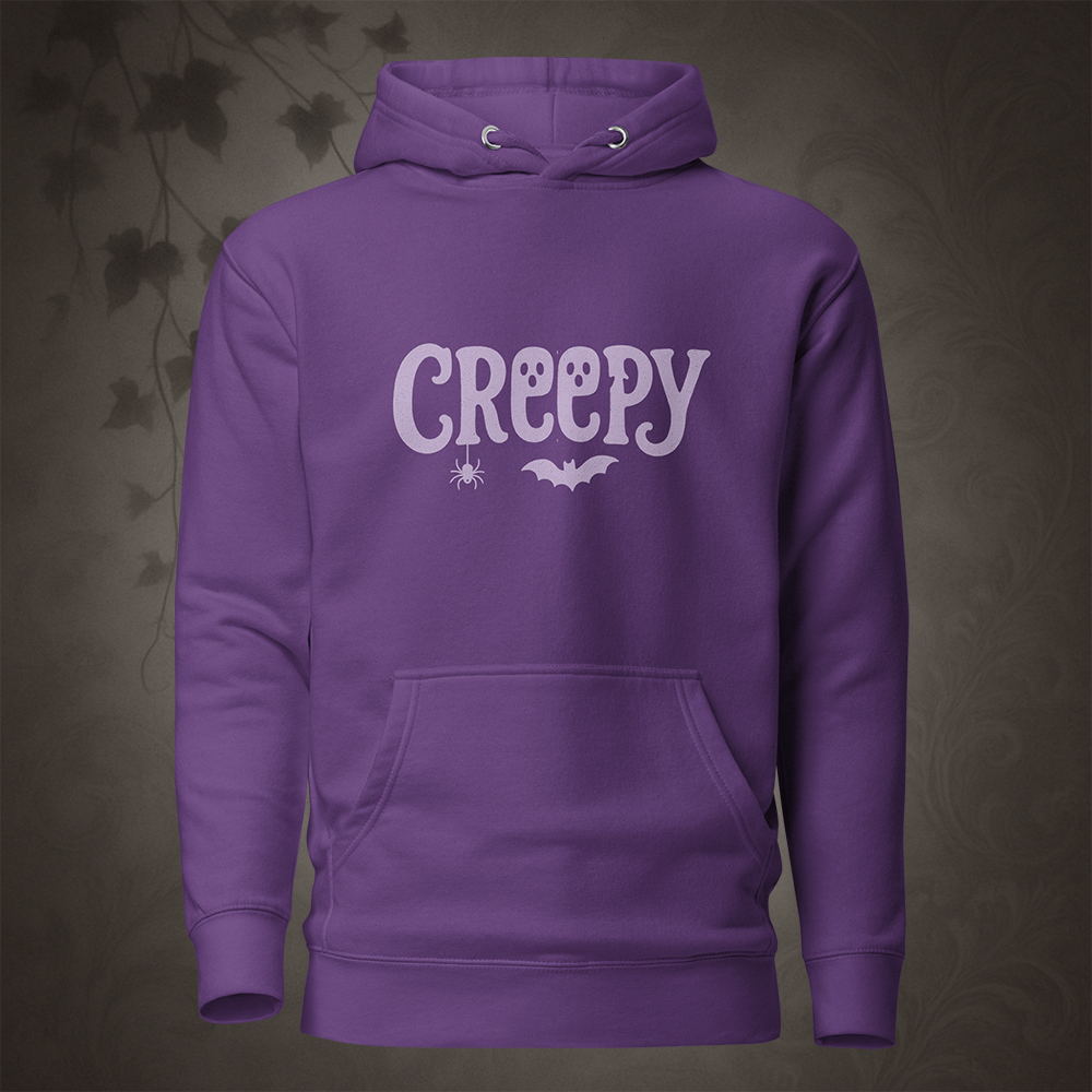 Purple hoodie with 'Creepy' text on a dark background