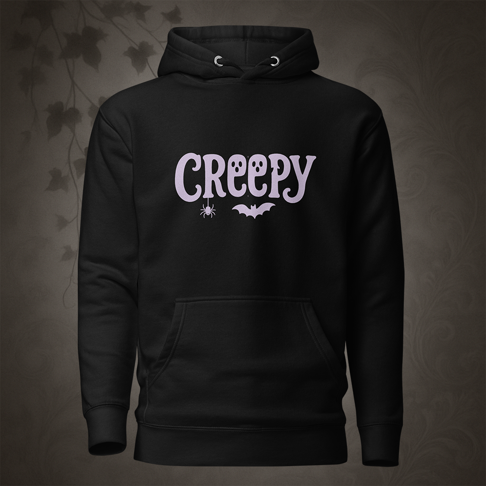 Black hoodie with 'Creepy' text and spider and bat graphics on a dark background