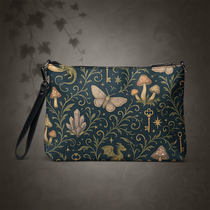Patterned pouch with mushrooms, butterflies, and keys on a dark background