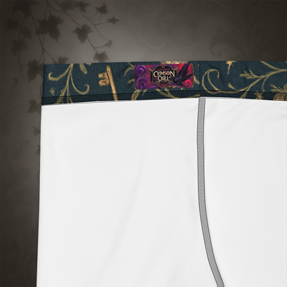 Close-up of a white garment with a decorative band featuring a logo on a dark background.