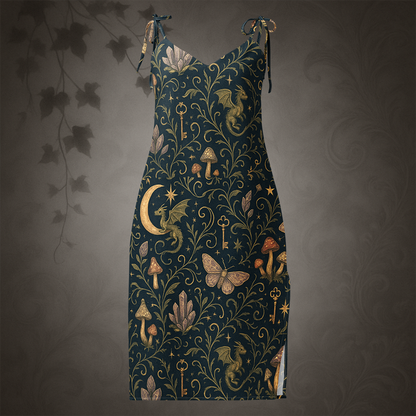 Dark blue dress with intricate gold and beige patterns on a gray background