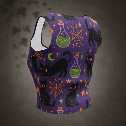 Purple tank top with Halloween-themed design featuring black cats, spider webs, and potion bottles on a dark background.